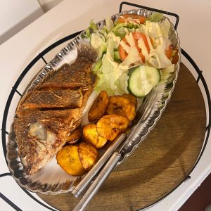 Fried Fish with plantain or chips or Sadza with veggies with salad